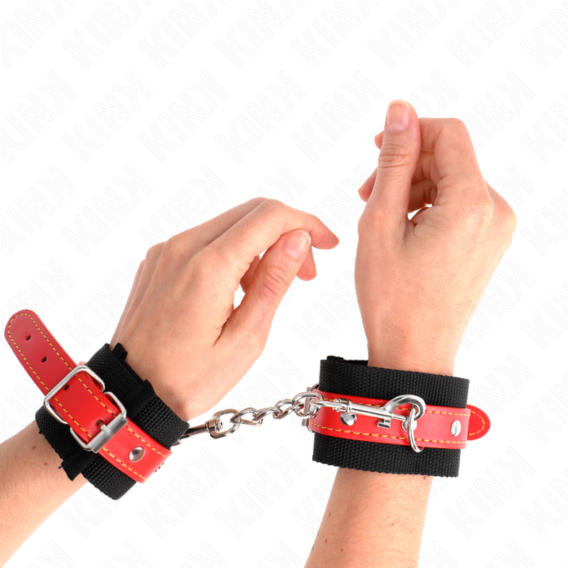 KINK - NYLON WRIST CUFFS BLACK WITH RED FAUX LEATHER ADJUSTABLE 19-24 CM X 5.5 CM