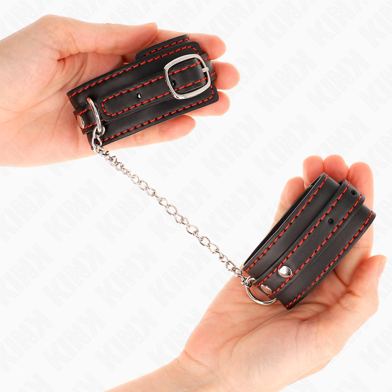 KINK - SMALL BLACK WRIST RESTRAINTS WITH RED LINING ADJUSTABLE 14-24 CM X 3.5 CM